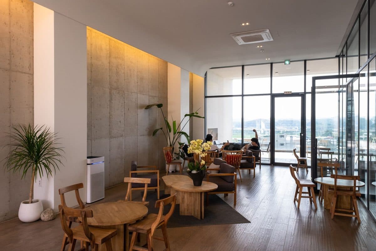 A room with large windows letting in daylight and fresh air