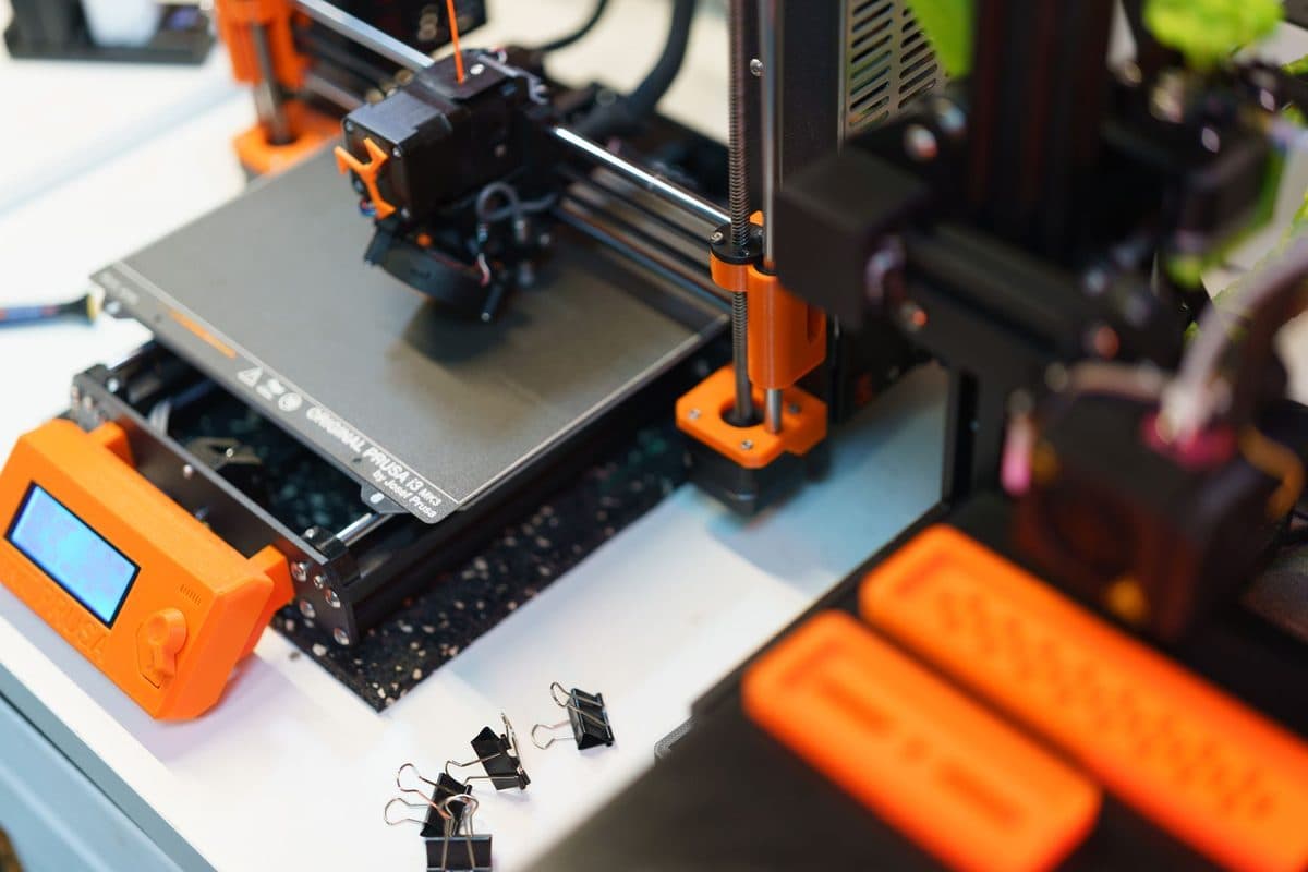 A 3D printer in a workshop setting
