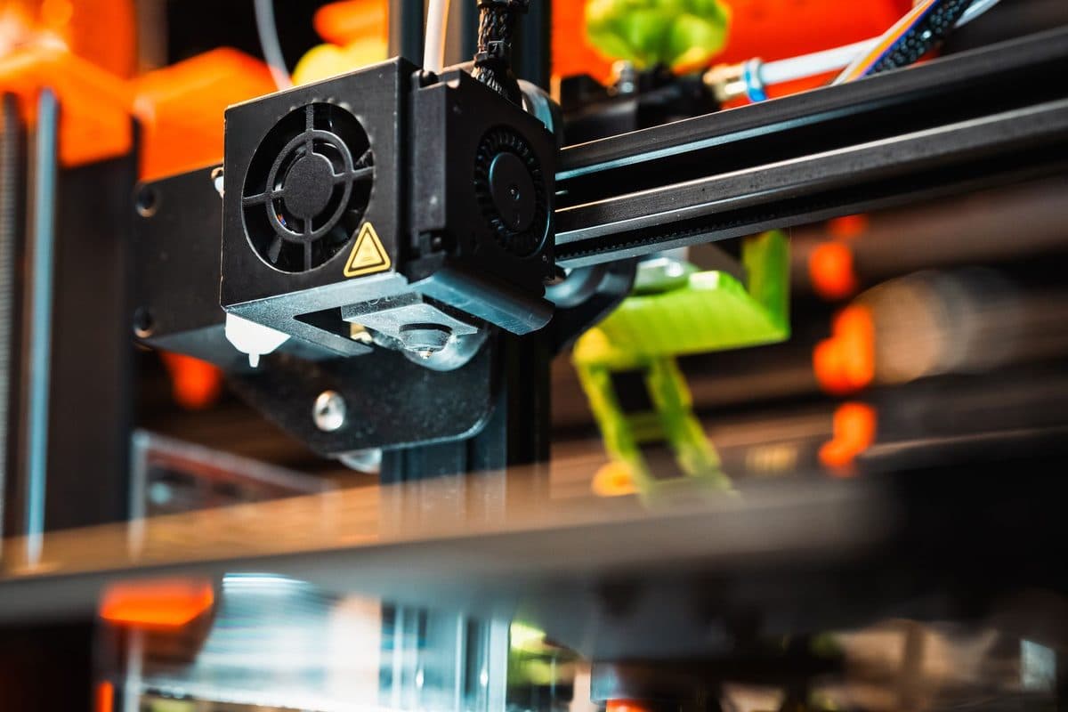 A 3D printer nozzle mid-print
