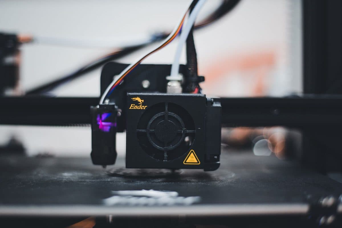 A 3D printer nozzle part-way through a print