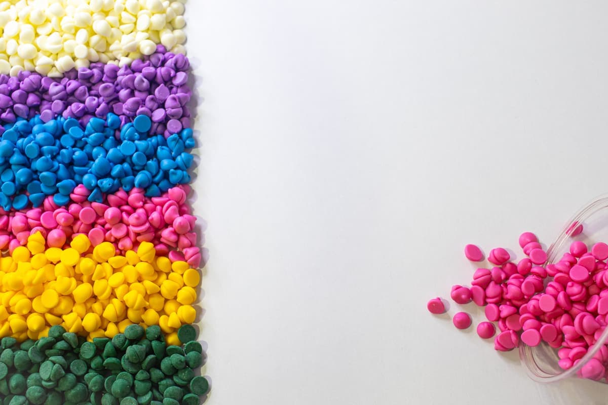 Colored plastic pellets arranged in rows