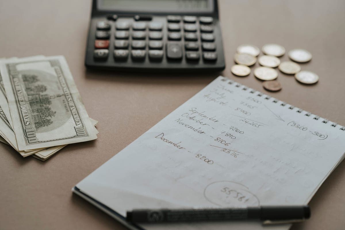 An open notebook and pen on a table